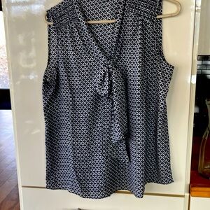 Chai’s navy /white sleeveless top